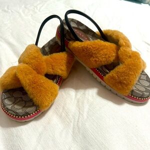 Coach fur sandals.